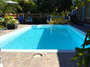 Villa chaleureuse près de Le Tampon avec piscine partagée
